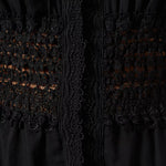 Black maxi dress with intricate lace cutout panel detail at waist — Charo Ruiz Ibiza | Endless UAE