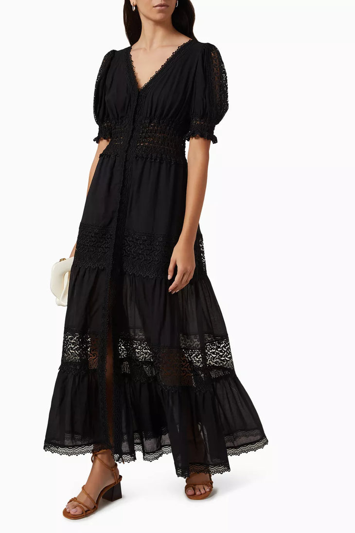 Black cotton maxi dress with lace trim, puff sleeves, and tiered skirt — Charo Ruiz Ibiza | Endless UAE