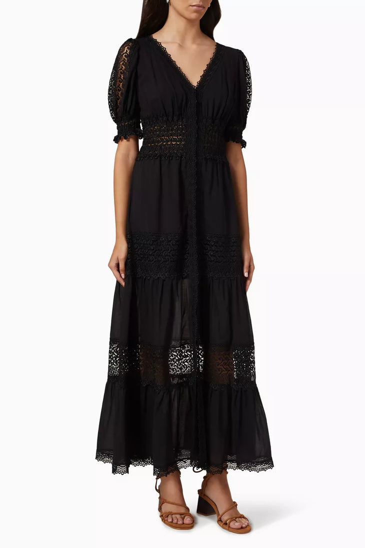 Black maxi dress with lace trim details, V-neck, puff sleeves, and tiered skirt — Charo Ruiz Ibiza | Endless UAE
