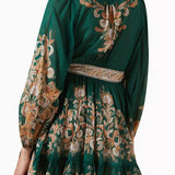 Emerald green mini dress with ornate paisley embroidery, long sleeves, wrap waist belt, and tiered ruffle hem — Zimmermann | Endless UAE