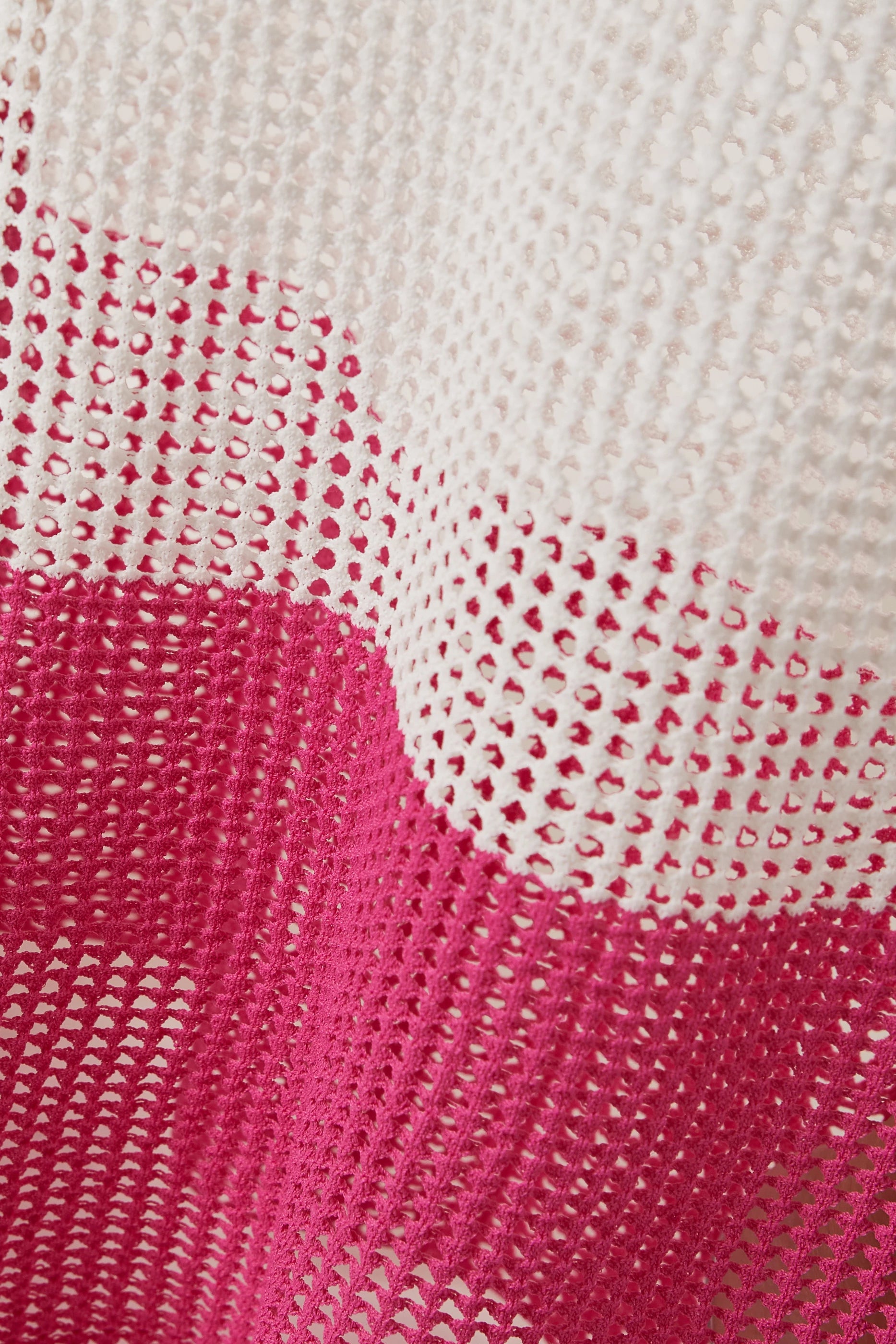 Lightweight knitted cover-up maxi dress in white and pink ombre pattern with open weave detail — PQ Swim | Endless UAE