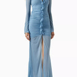 Woman wearing petrol blue long-sleeve maxi dress with ruched detailing and front slit — De La Vali | Endless UAE