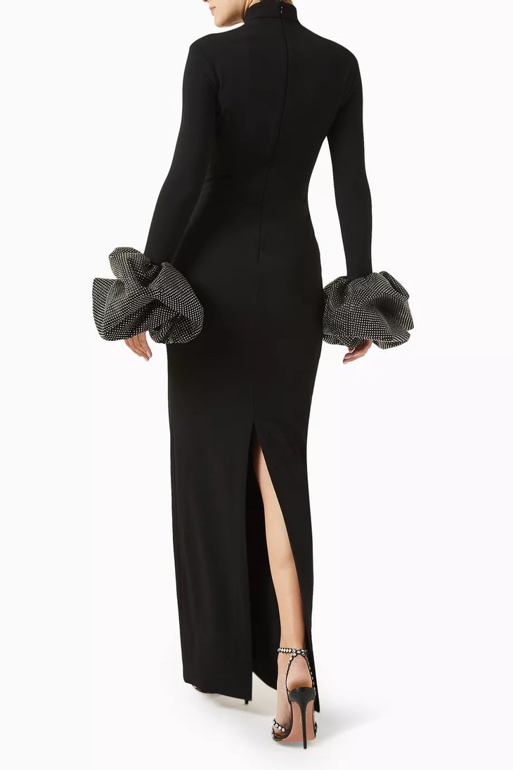 Woman wearing black turtleneck maxi gown with embellished puff sleeves — Endless | Endless UAE