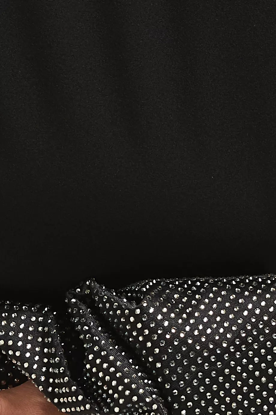 Woman wearing black turtleneck maxi gown with embellished puff sleeves — Endless | Endless UAE