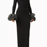 Woman wearing black turtleneck maxi gown with embellished puff sleeves — Endless | Endless UAE