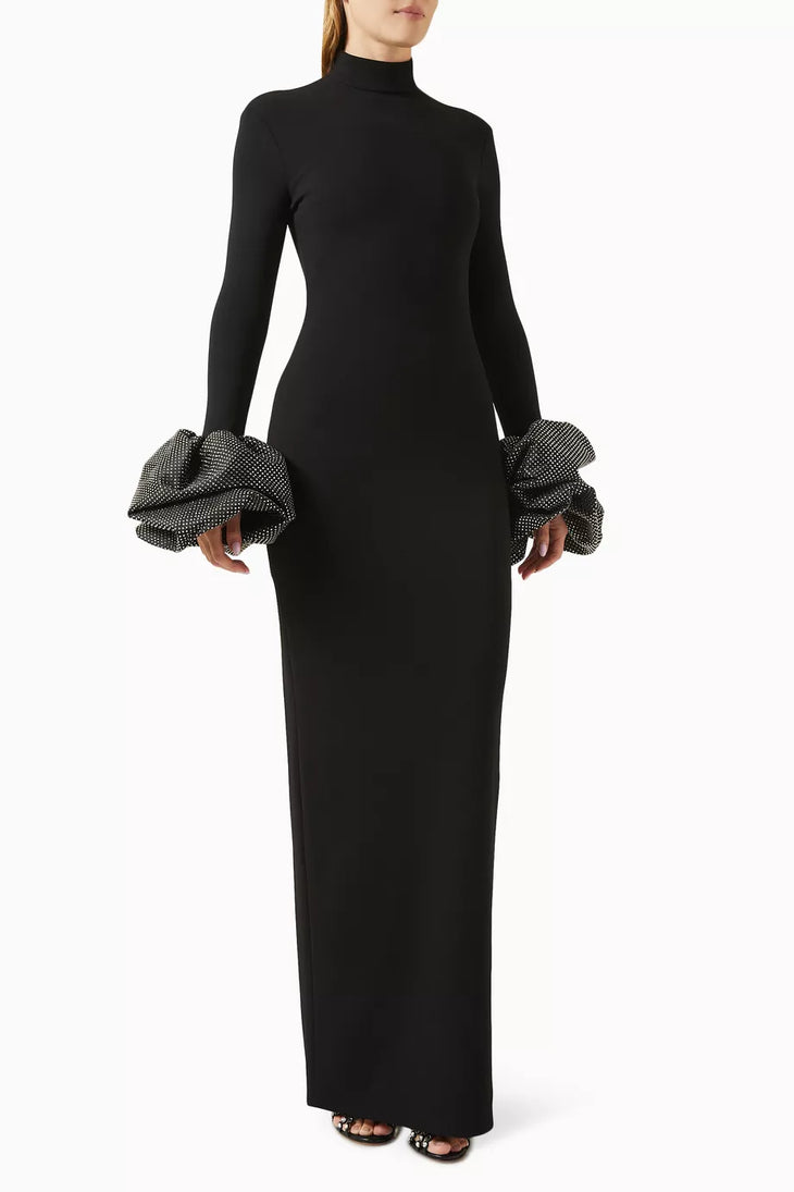 Woman wearing black turtleneck maxi gown with embellished puff sleeves — Endless | Endless UAE