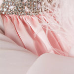 Pink crepe satin organza Swan Coord Set with feathered cape and embellished neckline — Manel | Endless UAE