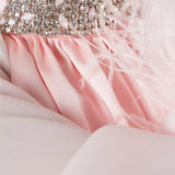 Pink crepe satin organza Swan Coord Set with feathered cape and embellished neckline — Manel | Endless UAE