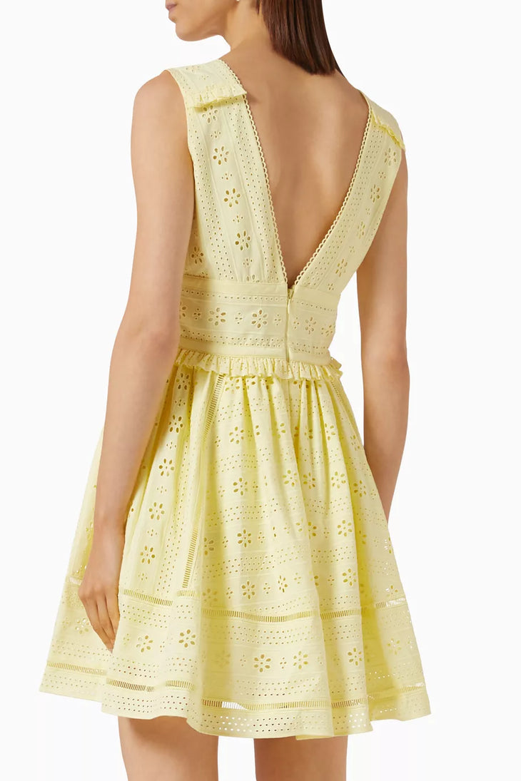 Yellow broderie anglaise mini dress with deep V-back, fitted bodice, and flared skirt with eyelet embroidery — Self-Portrait | Endless UAE