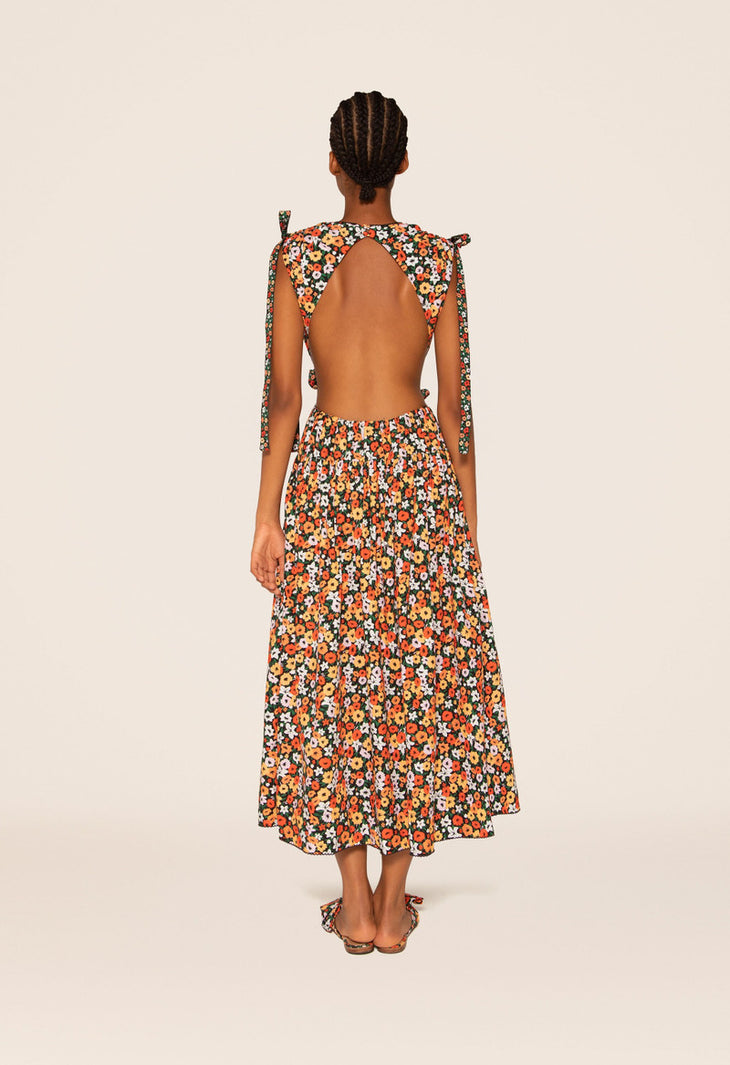 Woman wearing Guaguanco Midi Dress in colorful floral print with 3/4 sleeves — Agua By Agua Bendita | Endless UAE