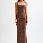Jasmyn Hot Fix Maxi Dress With Mesh Back in bronze worn by woman against beach backdrop — Meshki | Endless UAE
