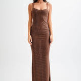 Jasmyn Hot Fix Maxi Dress With Mesh Back in bronze worn by woman against beach backdrop — Meshki | Endless UAE