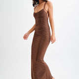 Jasmyn Hot Fix Maxi Dress With Mesh Back in bronze worn by woman against beach backdrop — Meshki | Endless UAE