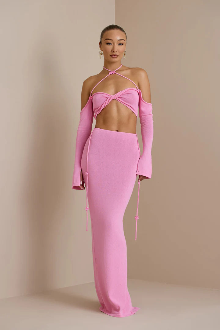 Pink two-piece co-ord set with twisted halter crop top and matching maxi skirt — Endless | Endless UAE