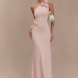 Woman wearing pale pink one-shoulder knit maxi dress, back view against neutral background — Meshki | Endless UAE