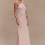 Woman wearing pale pink one-shoulder knit maxi dress, back view against neutral background — Meshki | Endless UAE