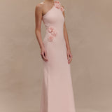 Woman wearing pale pink one-shoulder knit maxi dress, back view against neutral background — Meshki | Endless UAE