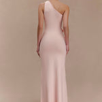 Woman wearing pale pink one-shoulder knit maxi dress, back view against neutral background — Meshki | Endless UAE