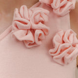 Woman wearing pale pink one-shoulder knit maxi dress, back view against neutral background — Meshki | Endless UAE