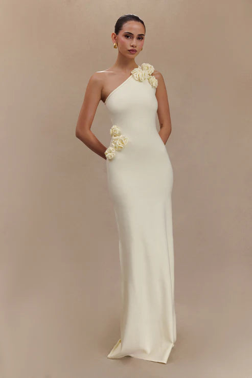 Woman modeling cream one-shoulder maxi dress with floral embellishment — Meshki | Endless UAE