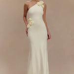 Woman modeling cream one-shoulder maxi dress with floral embellishment — Meshki | Endless UAE