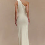 Woman modeling cream one-shoulder maxi dress with floral embellishment — Meshki | Endless UAE