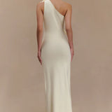 Woman modeling cream one-shoulder maxi dress with floral embellishment — Meshki | Endless UAE