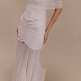Woman wearing blush off-shoulder maxi dress with ruched details and mesh panel — Meshki | Endless UAE