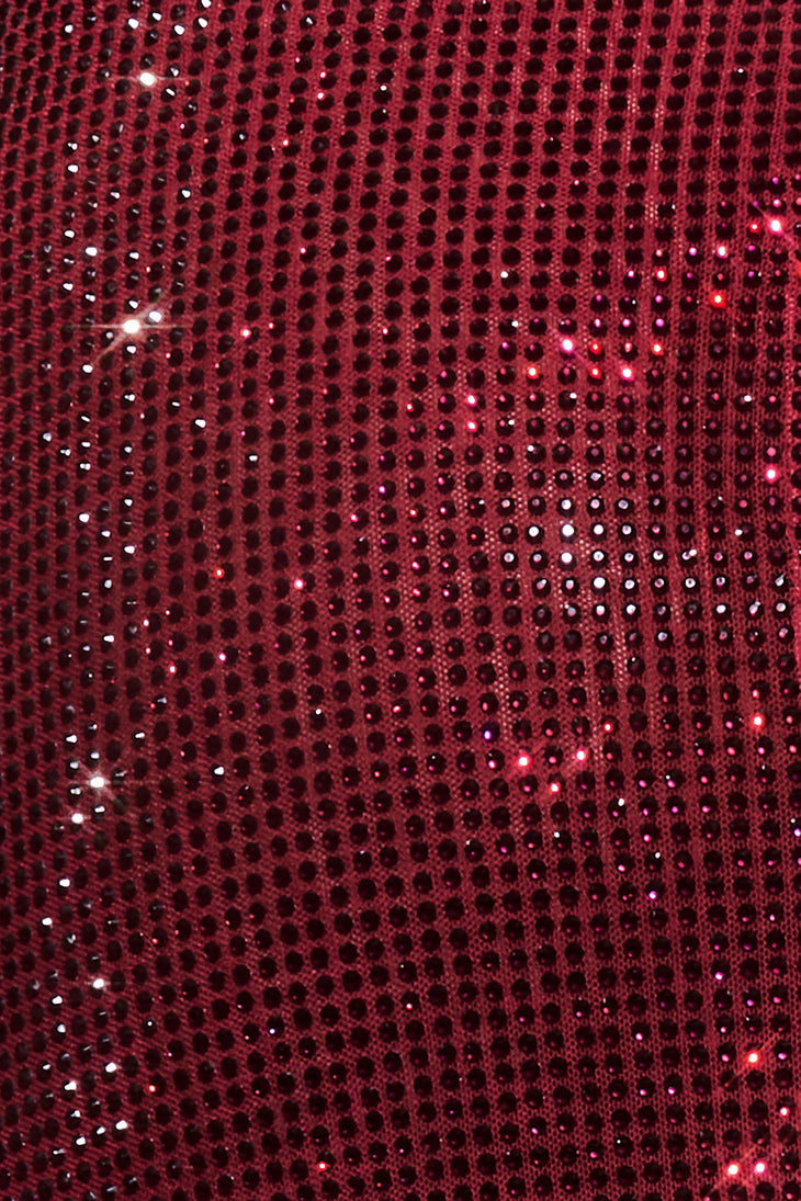 Shimmering deep red sequin fabric with sparkling diamante embellishments in close-up detail — Meshki | Endless UAE