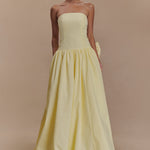 Pale yellow strapless maxi dress with fitted bodice and gathered full-length skirt — Meshki | Endless UAE