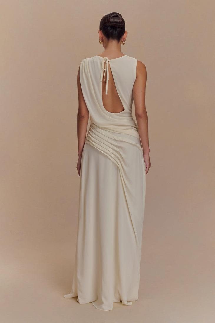 Ivory sleeveless maxi dress with open back cutout detail and draped waist, back view — Meshki | Endless UAE