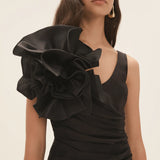 Black wrap mini dress with dramatic shoulder ruffle and feathered heels — Aje | Endless UAE