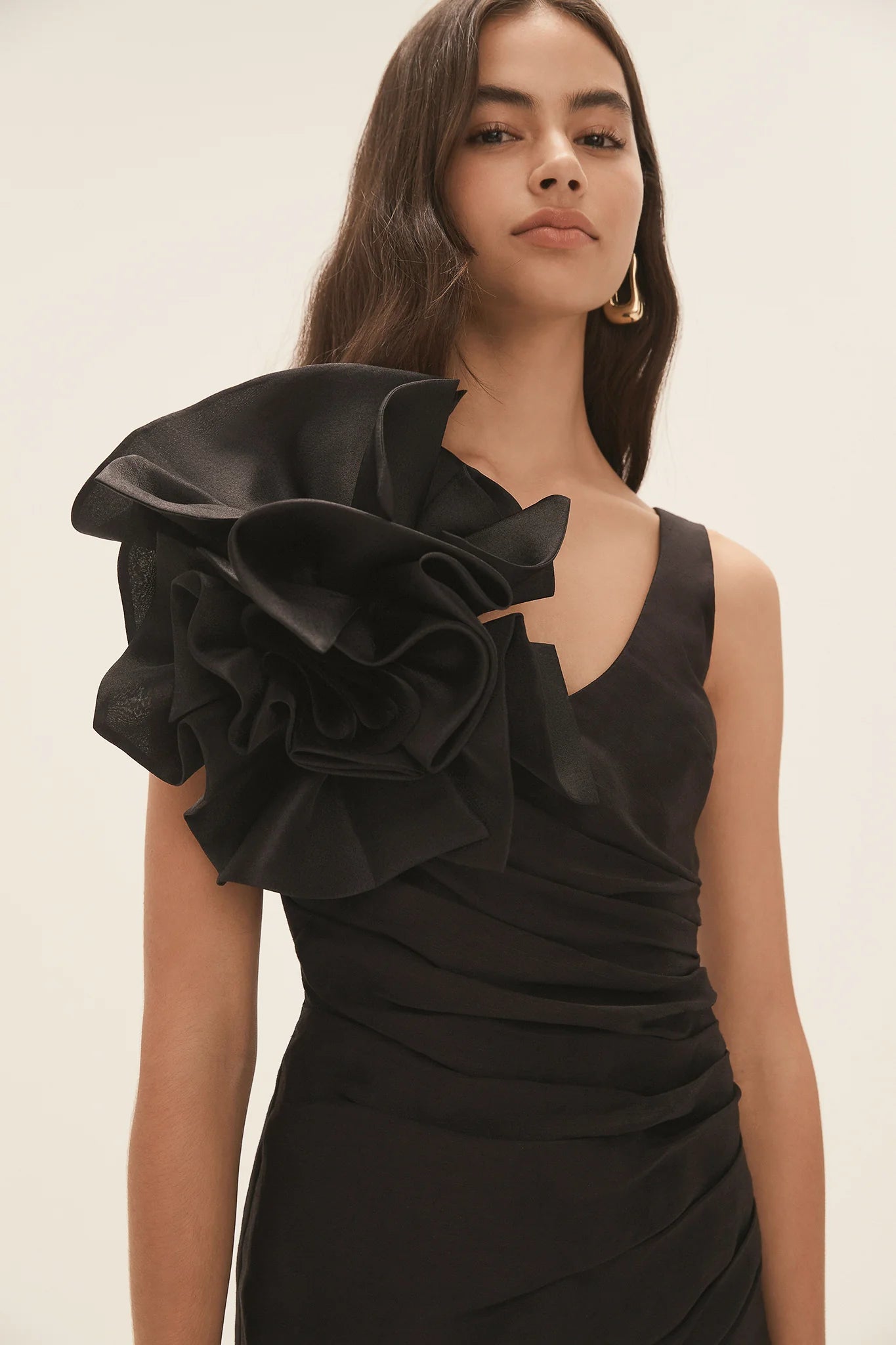 Black wrap mini dress with dramatic shoulder ruffle and feathered heels — Aje | Endless UAE