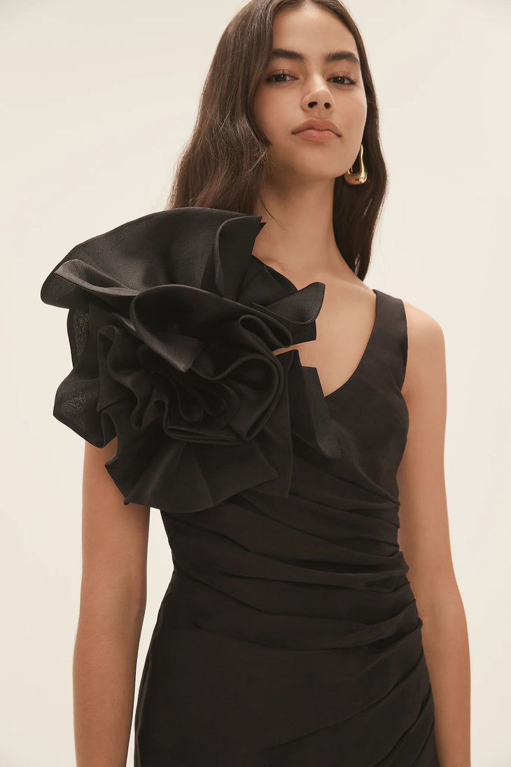 Black wrap mini dress with dramatic shoulder ruffle and feathered heels — Aje | Endless UAE