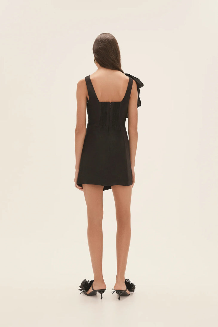 Black wrap mini dress with dramatic shoulder ruffle and feathered heels — Aje | Endless UAE