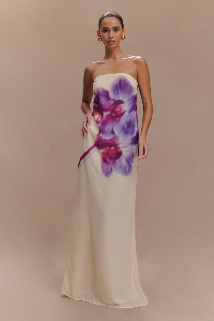 Elegant strapless maxi dress in cream chiffon with vibrant purple and pink watercolor floral print, flowing silhouette — Meshki | Endless UAE