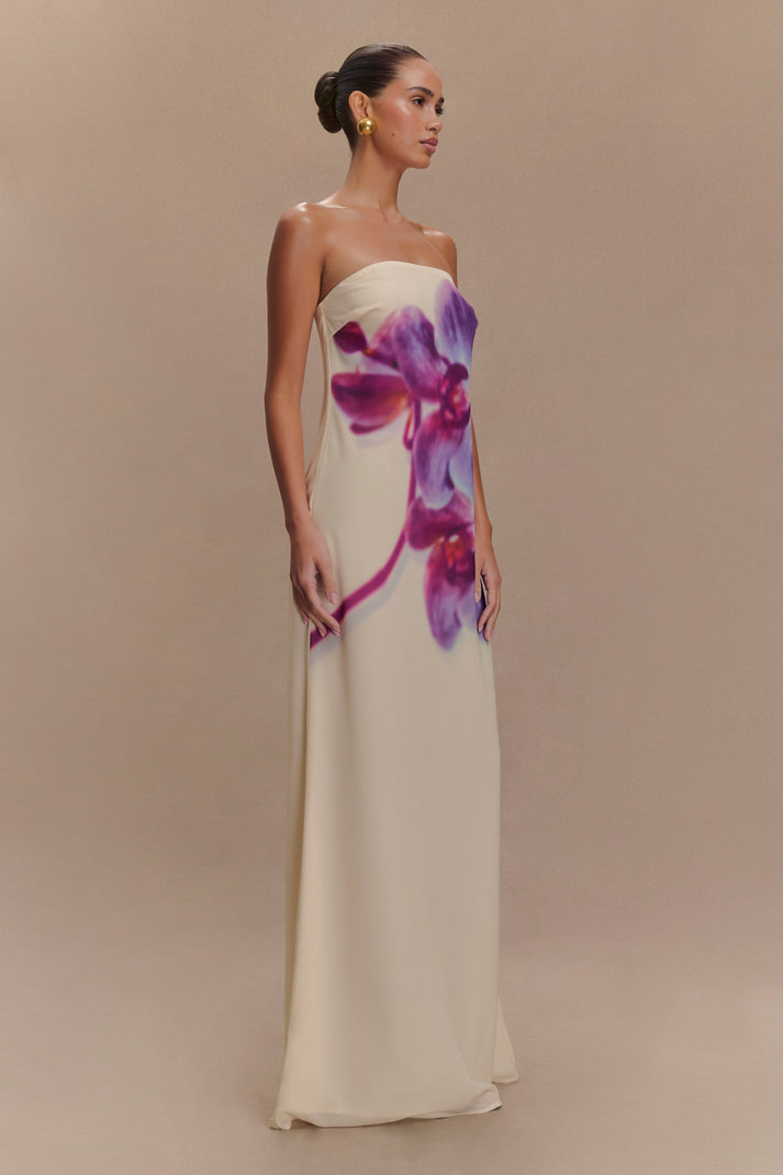 Elegant strapless maxi dress in cream chiffon with purple and pink floral print, floor-length silhouette — Meshki | Endless UAE
