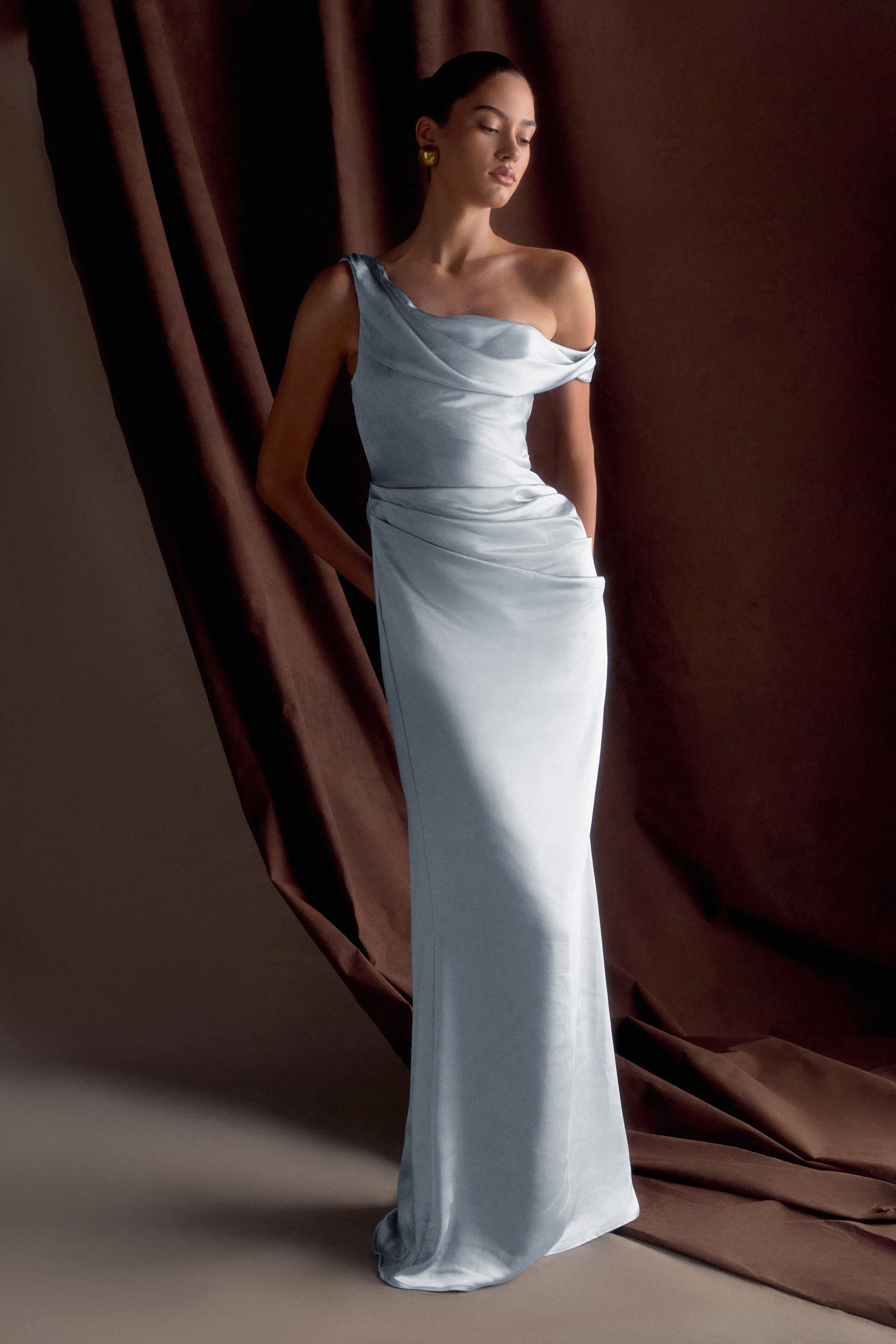 Woman wearing white off-shoulder satin maxi dress with draped neckline — Meshki | Endless UAE