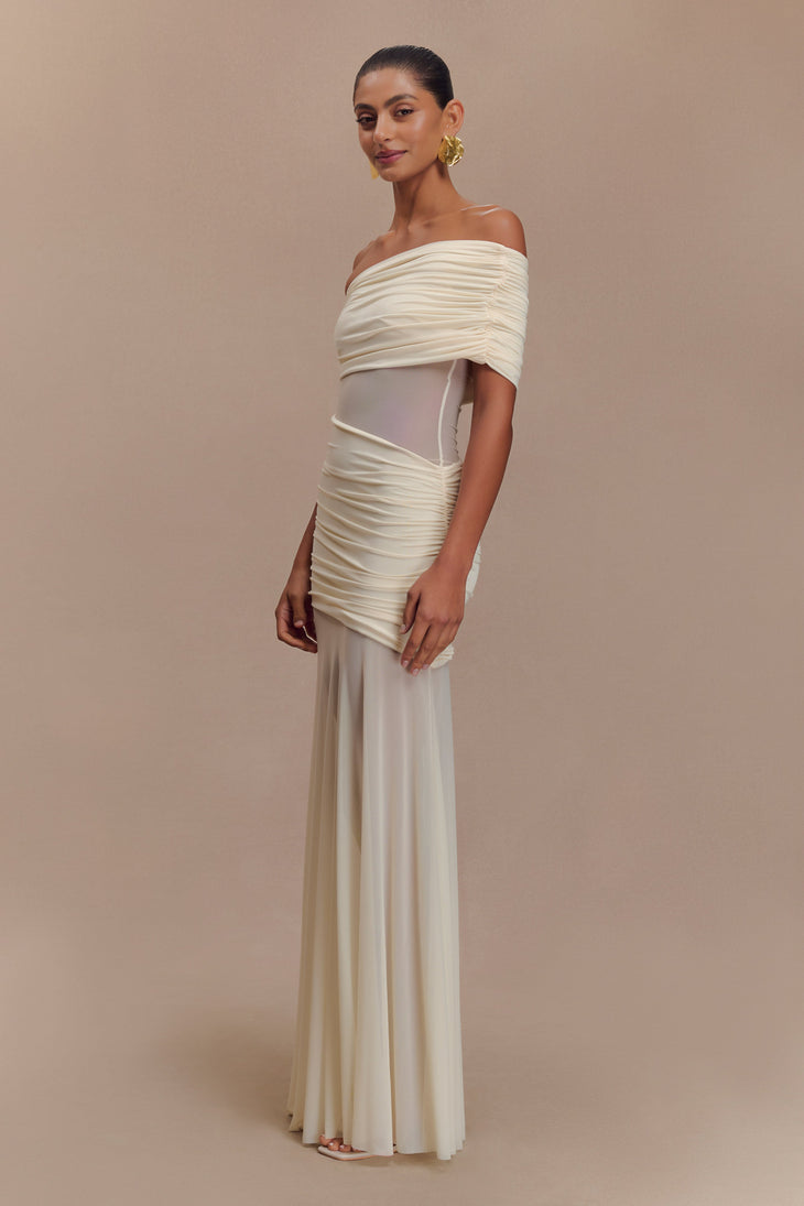 Elegant off-white mesh maxi dress with ruched off-shoulder bodice and flowing silhouette on model — Meshki | Endless UAE