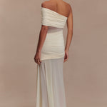 Elegant white off-shoulder maxi dress with ruched mesh bodice and flowing skirt, back view — Meshki | Endless UAE