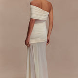 Elegant white off-shoulder maxi dress with ruched mesh bodice and flowing skirt, back view — Meshki | Endless UAE