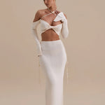 Elegant white two-piece co-ord set with twisted halter crop top and high-waisted maxi skirt — Wanderdoll | Endless UAE