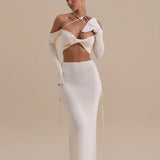 Elegant white two-piece co-ord set with twisted halter crop top and high-waisted maxi skirt — Wanderdoll | Endless UAE