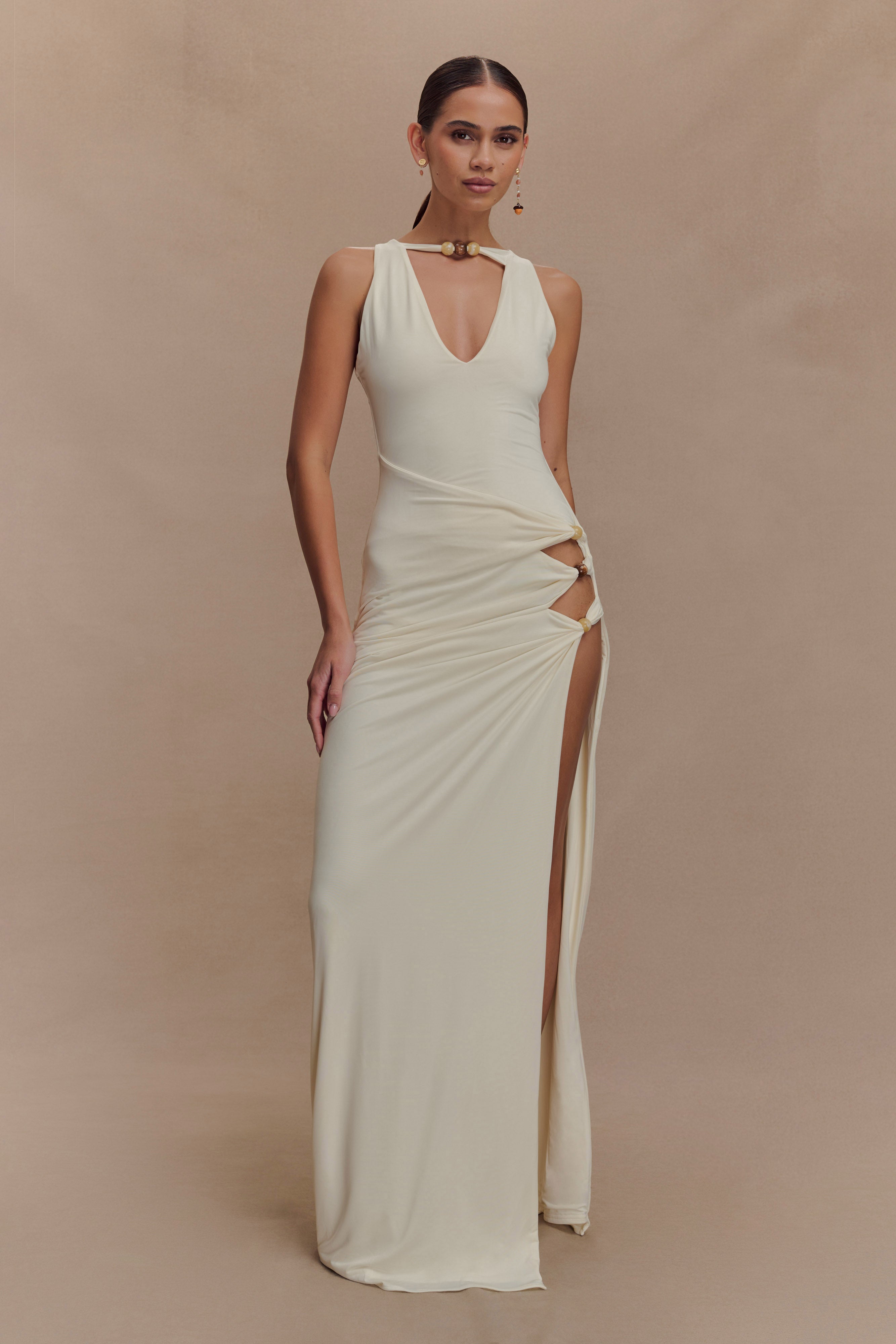 Cream sleeveless maxi dress with beaded neckline and side cutouts — Meshki | Endless UAE