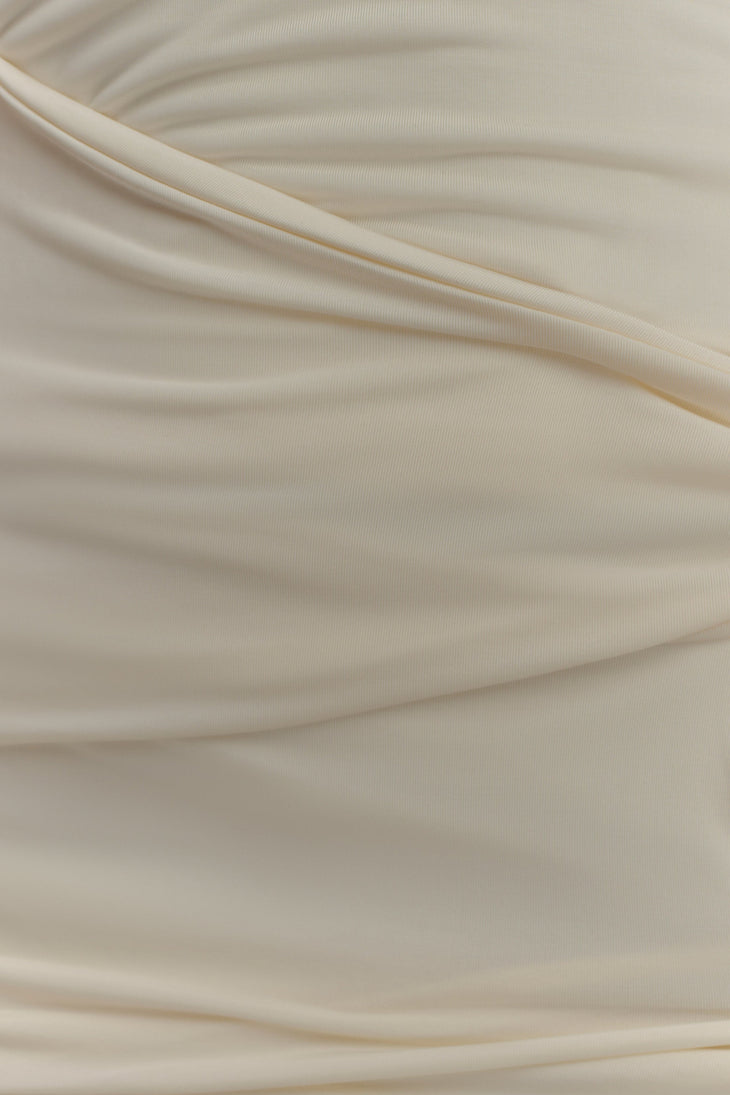 Cream sleeveless maxi dress with beaded neckline and side cutouts — Meshki | Endless UAE