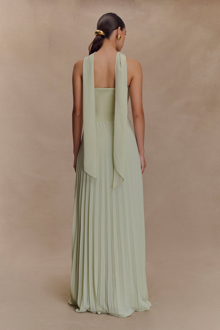 Woman wearing pale sage strapless maxi dress with pleated skirt and matching neck scarf — Meshki | Endless UAE