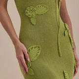 Green knit maxi dress with leaf appliqués and cutout details — Wanderdoll | Endless UAE