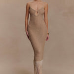 Woman wearing beige metallic knit midi dress with keyhole neckline and fringe hem — Meshki | Endless UAE