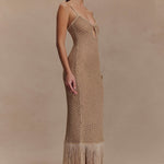 Woman wearing beige metallic knit midi dress with keyhole neckline and fringe hem — Meshki | Endless UAE