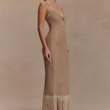 Woman wearing beige metallic knit midi dress with keyhole neckline and fringe hem — Meshki | Endless UAE